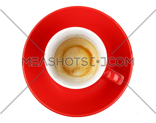 One empty finished morning espresso coffee shot in small red cup with saucer isolated on white background, top view, point of view