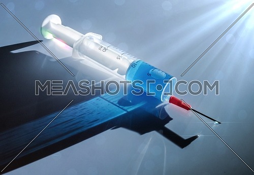 Syringe with medication illuminated laterally, conceptual image