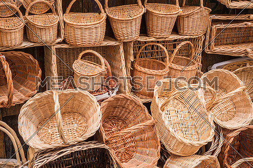 Wicker hand-made baskets at the shop of a touristic street of Segovia Castilla and Leon Spain.