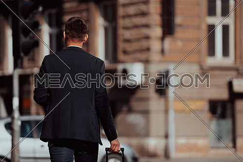Portrait of a tourist man carrying a suitcase and holding a cup of coffee while walking outdoors on the street. Tourism concept.