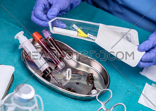Nurse prepares Venous catheters of Long Duration in a hospital, Accessing Indwelling Central Venous Lines, conceptual image