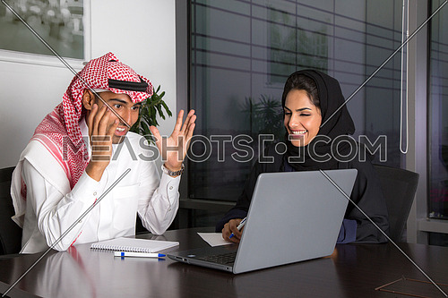 Excited employees after successful results in the meeting