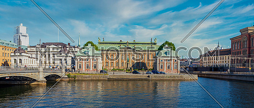 Stockholm, Sweden - June 26 2022: View from stromsborgsbron bridge overlooking Supreme Court of Sweden, and House of Nobility, located on the old town, Gamla Stan