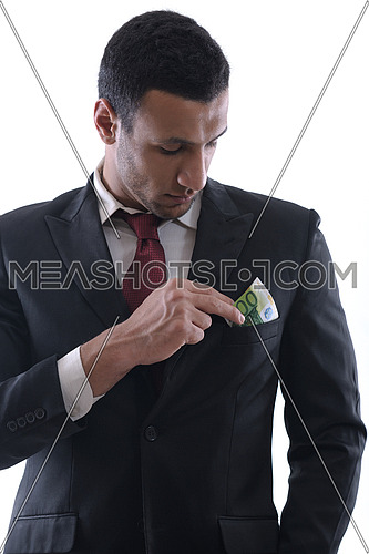 Portrait of a business man holding and catch falling money bills, isolated on white background in studio