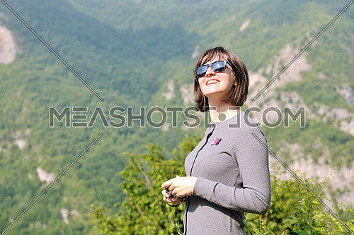 portrait of happy young  woman in nature