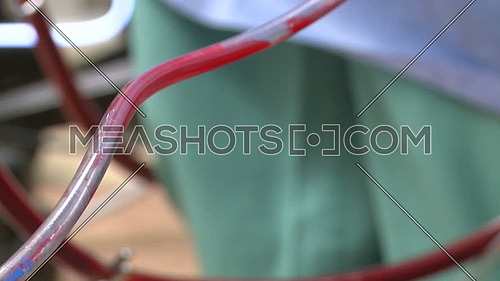 Close up shot for Tubes carry blood from heart-lung bypass machine