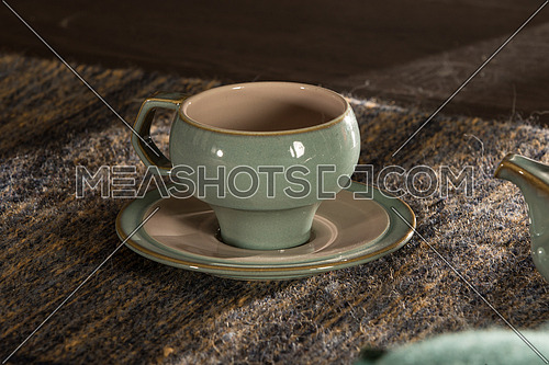 empty tea cup on a plate