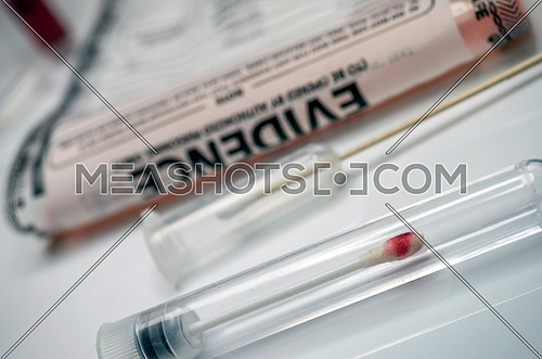 Detail of DNA sampling tubes in Laboratorio forensic equipment, conceptual image