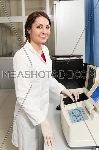 Portrait Of A Caucasian Student In A Chemistry Lab Smiling And Looking In The Camera