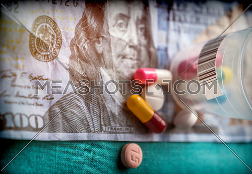Some medications on a ticket of dollar, conceptual image copay health
