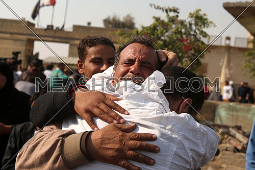 Father embraces his son after his release from the prison of Turah among the released by presidential pardon on 14 march 2017
