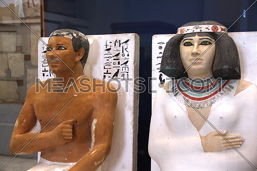 a photo from the Egyptian museum in Cairo showing a display of monumental pharaohs statues belonging to ancient Egyptian civilization