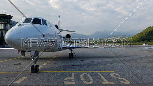 Corporate business jet on the tarmac at a trendy mountain resort