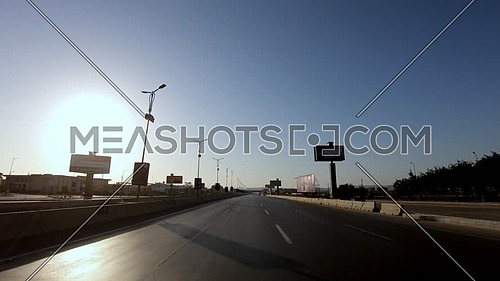 Drive through Cairo-Alex Desert Road by day.