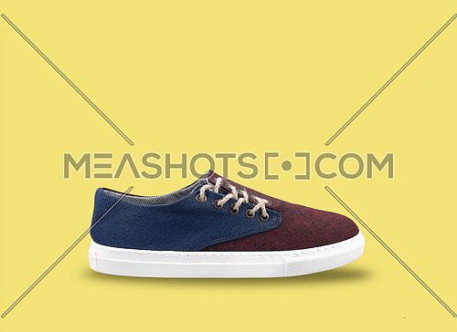 men shoes in yellow background