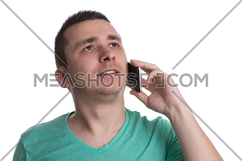 Portrait Of Young Man Talking On Cell Phone - Isolated On White Background