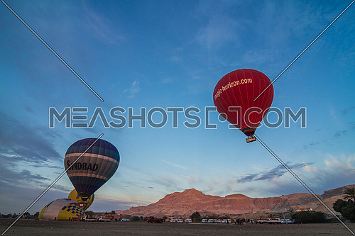 Low Angel shot for Hot Air Ballons take off in Luxor