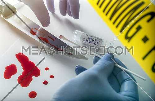Crime scene for cutting weapon, Judicial police takes blood samples in scene of murder, conceptual image, conceptual image
