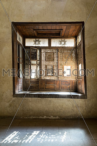 Interleaved wooden window (Mashrabiya) with built-in couch, Medieval Cairo, Egypt