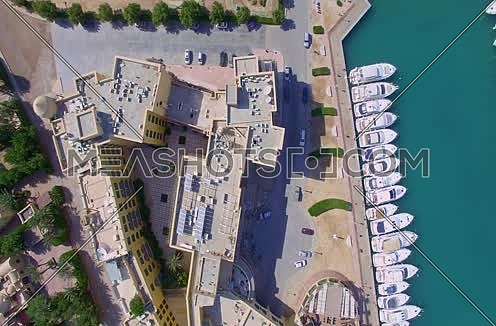 zoom in using  Drone shot flying above Al Gouna Marina  at Day 