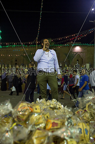 Male Street Seller sells The lanterns of the holy month of Ramadan.