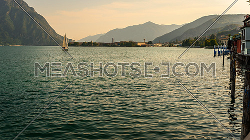 In the picture a view of Lake Iseo from the city of Lovere, on the side left of a sailboat.