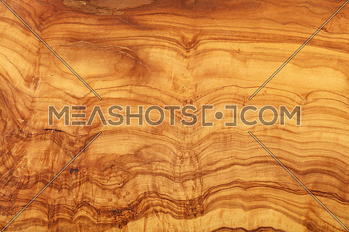 Close up yellow and brown pattern of olive wood woodgrain texture background