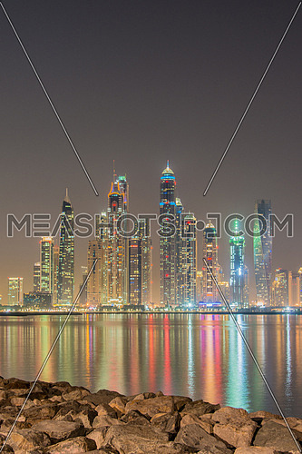 DUBAI - JANUARY 8, 2015: Dubai Marina skyscrapers on January 8 in UAE, DUBAI. Dubai Marina skyscrapers are among the higherst in the world