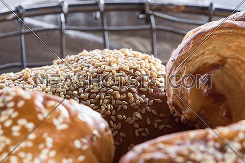 Pastry with sesame in a basket