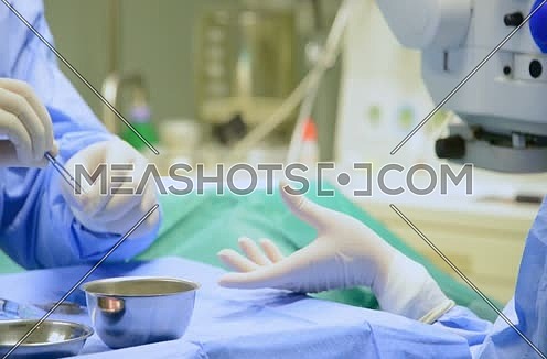 close up on doctor hands during surgery