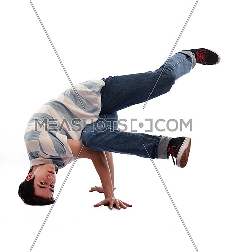 young boy man teen dancing and jumping isolated on white background in studio