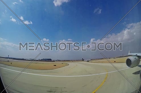 Etihad airways airplane during take off passenger view