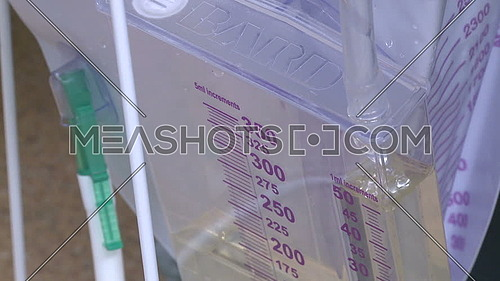 Close shot for Liquid flows into medical container