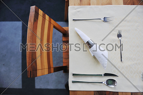 luxury restaurant indoor with nice cutlery and decoration