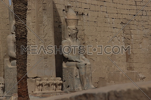 a photo for Luxor temple showing the statues of the Pharaohs , architecture , in Luxor city , Egypt