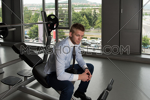 Business Man Resting After Exercise In Gym