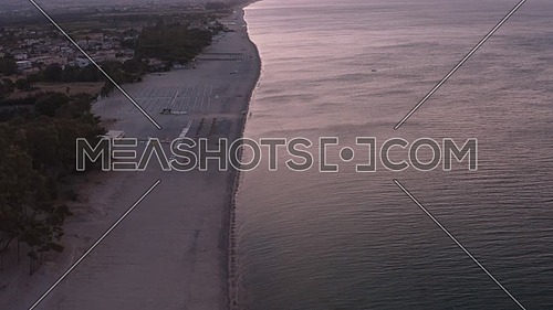 Aerial view of beautiful mediterranean sea and beach at sunrise, seascape of Calabria,  Simeri Mare, Southern Italy