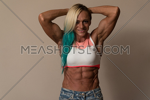 Strong Middle Aged Woman Bodybuilder With Six Pack