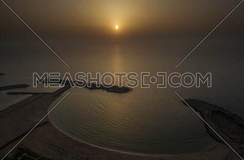 Top fixed shot for sunset into sea in alexandria