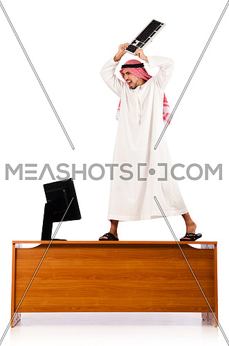 Arab man sitting at his desk