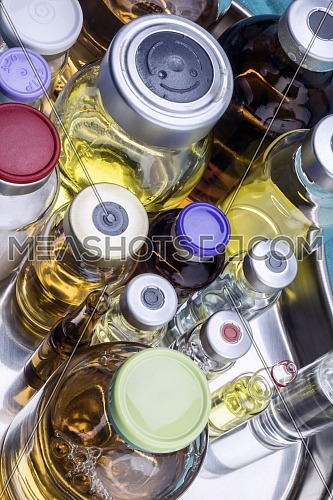 Several vials with different medication in hospital, conceptual image