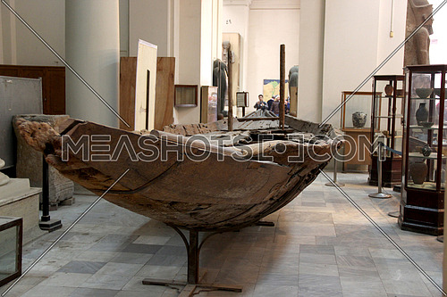 a photo from inside the Egyptian museum showing Pharaoh sun boat as they believe will use in traveling in other world after death