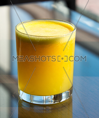 a glass of orange juice