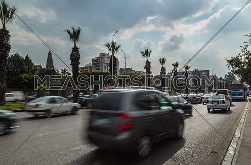 Zoom OUT Shot for traffic at Salah Salim Street showing Le Baron Palace in background at Daytime