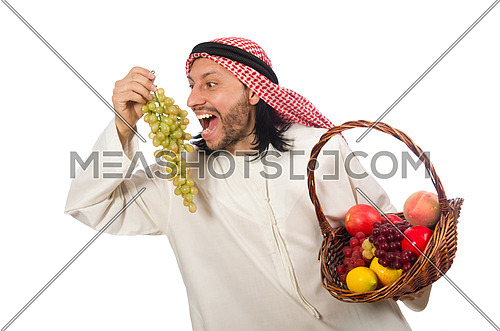 Arab man with fruits isolated on white