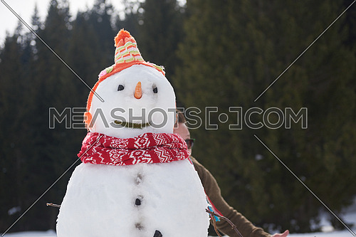 Snowman wearing a scarf