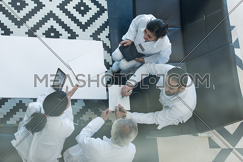 top view of middle eastern medical staff in meeting together in hospital