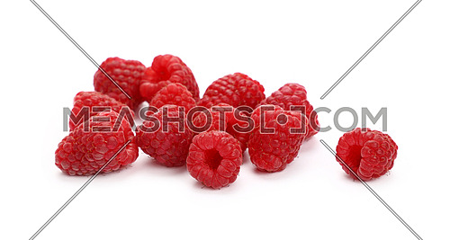 Group of fresh red ripe mellow raspberry berries isolated on white background, close up, low angle view