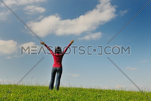 Young woman relax and have fun  in the field