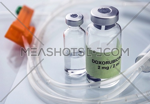 Vials of different size with medication used for neurodegenerative diseases, conceptual image